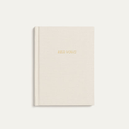 Single ivory hardcover vow book with HER VOWS embossed in gold foil